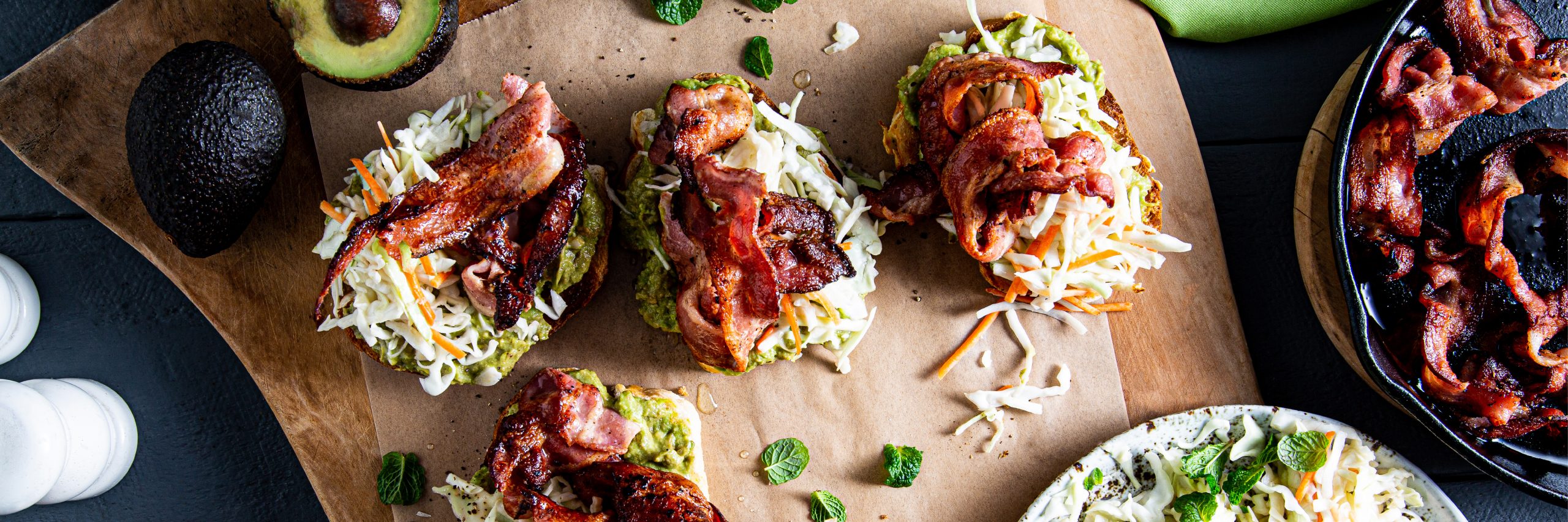 Coleslaw and bacon open sandwiches