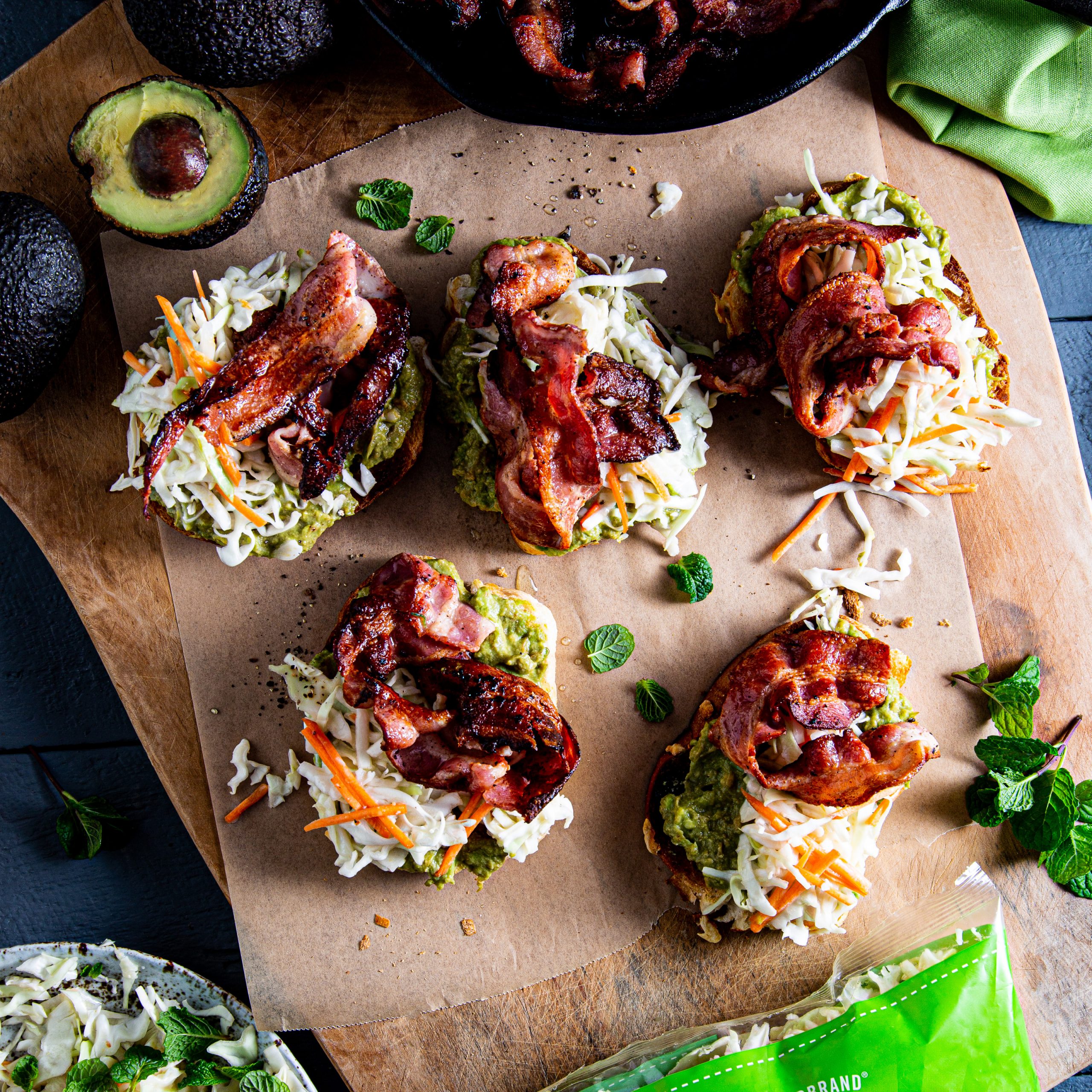 Coleslaw and bacon open sandwiches