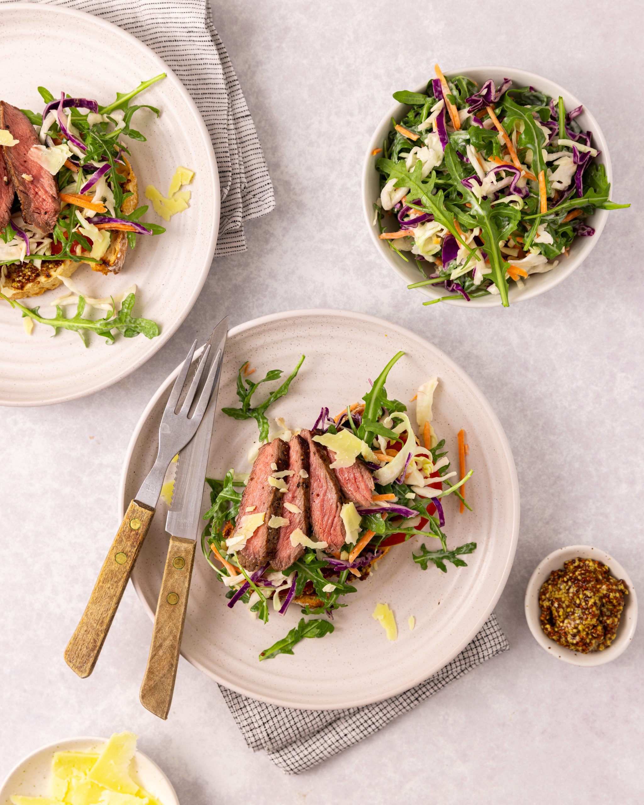OPEN STEAK SANDWICHES WITH ROCKETSLAW AND SHAVED PARMESAN - LeaderBrand